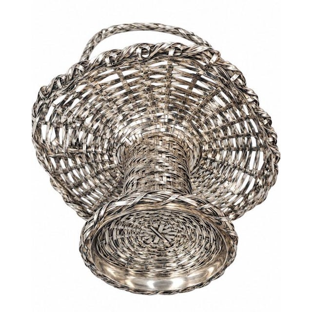 Unique Japanese ikebana or fruit basket. Hand woven from sterling sheet cut into strips. Diameter is 11", base is 4" high,...
