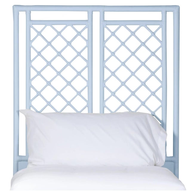 This headboard features classic Rattan design in a geometric pattern. Constructed of solid rattan and hand bound with...
