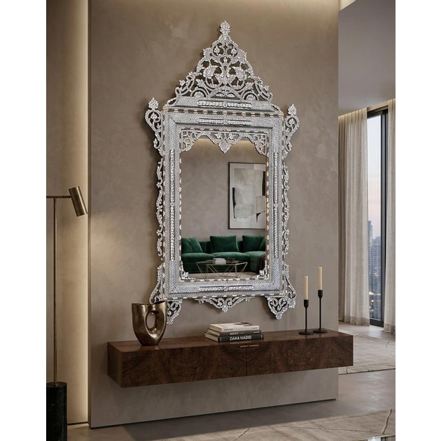 This elegant white mother-of-pearl inlaid mirror is a remarkable example of traditional craftsmanship from Damascus,...