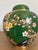 Beautiful Chinese cloisonné lidded ginger jar featuring flowering prunus branches against a rich green enamel ground. Fine...