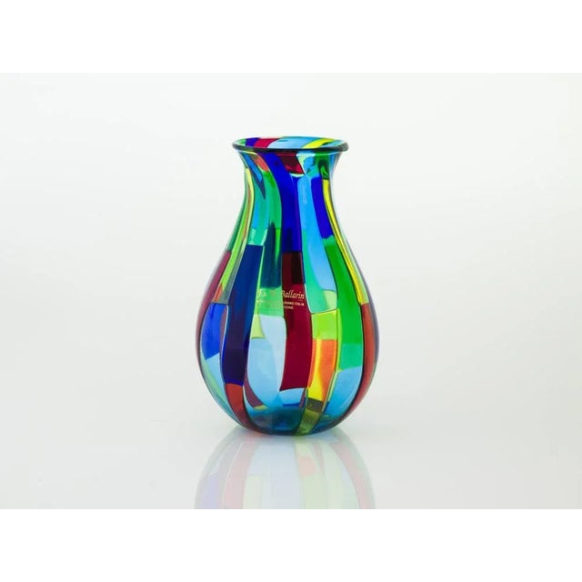 Blown Murano glass vase, "Acquamarina" design. Made by master Angelo Ballarin according to Murano techniques. The vase is...