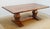 Dining Table by Ralph Lauren. Store item #552. It features trestle base and solid wood construction .