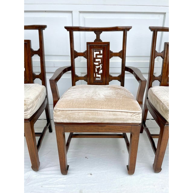 Here is a fantastic set of FIVE Asian dining chairs with upholstered seats and carved wood backrests. Each chair has a...