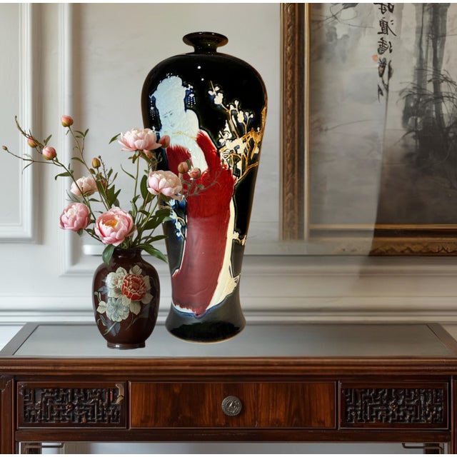 This vintage Palace Vase with Chinese seal script stands an impressive 23 inches tall and 10 inches wide. The body rises...