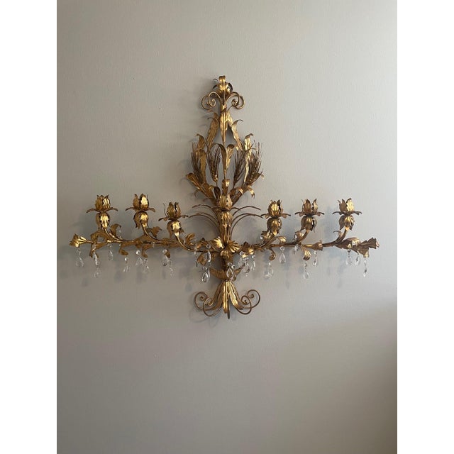 An elaborate 43" wide Italian Gilt Tole "tole peinte" Candelabra style candle or light sconce. Circa Mid 20th Century....