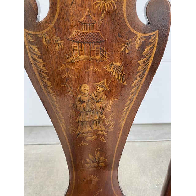 Mid-20th-century Queen Anne-style armchair with a traditional yoke-top and "vase" (vasiform) splat. Features the...