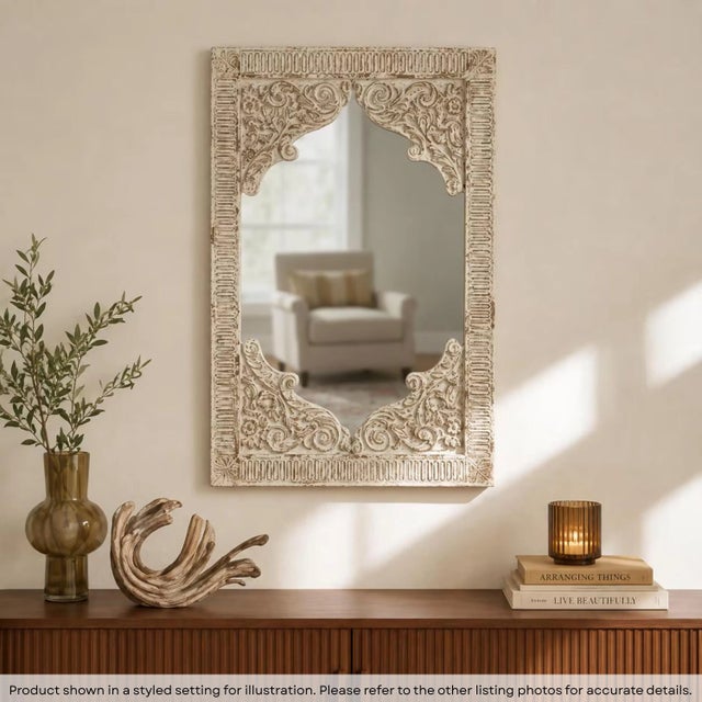 Dimensions: 38" W X 1" D X 57" H Features: • Intricately carved mirror • 100% solid wood construction • Hand carved by...