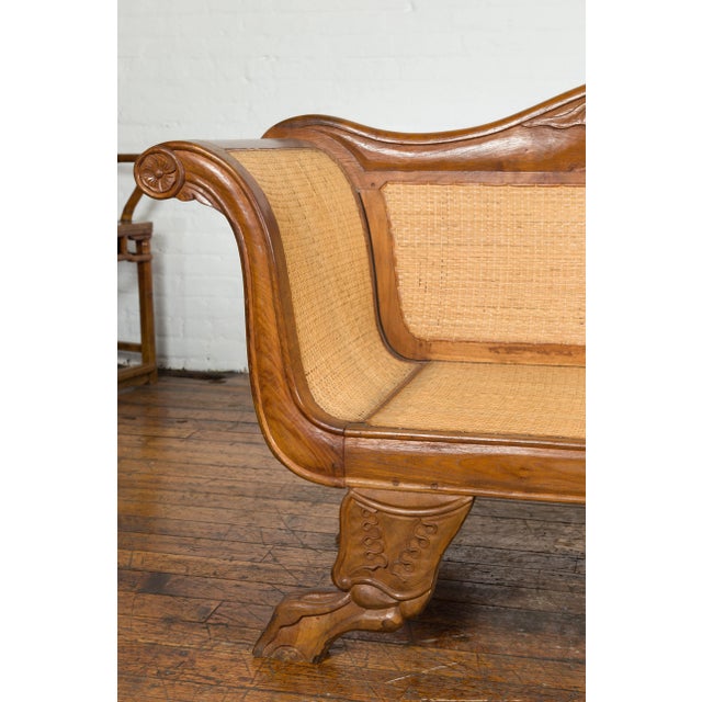 Dutch Colonial Javanese Teak Settee with Carved Décor and Inset Woven Rattan For Sale - Image 4 of 12