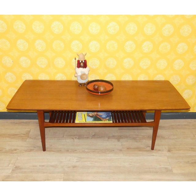 A truly beautiful piece of furniture! Uncluttered Danish design Timeless living room coffee table Made of solid teak and...