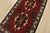 An authentic vintage tribal Baloch rug hand-knotted with fine wool and natural dyes. This nomadic oriental rug features...