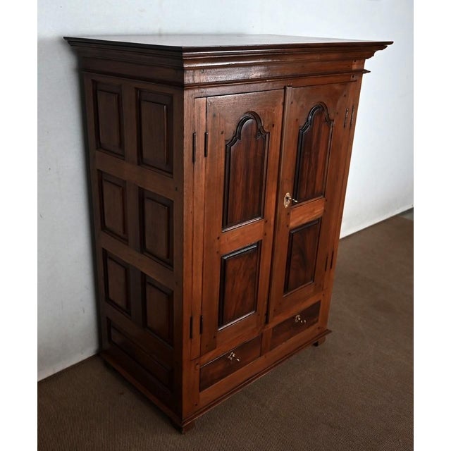 This century-old cabinet, in the style of Louis XIV, was made in the region of Pondicherry, a former French trading post...