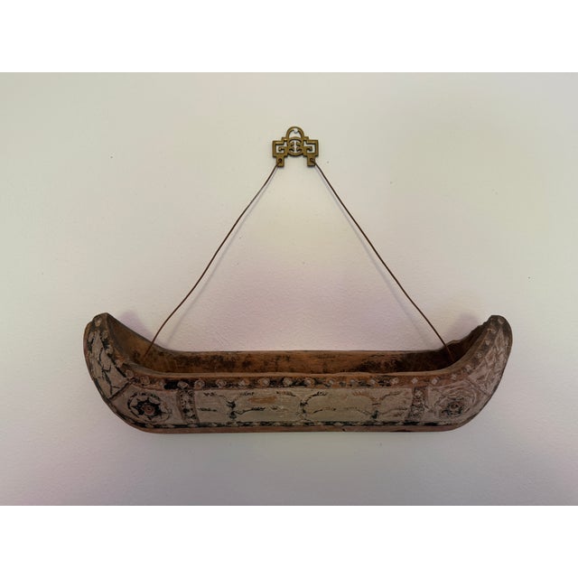 This small carved canoe is a fascinating piece of vintage folk art, believed to come from the South Pacific Islands, most...