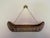 This small carved canoe is a fascinating piece of vintage folk art, believed to come from the South Pacific Islands, most...
