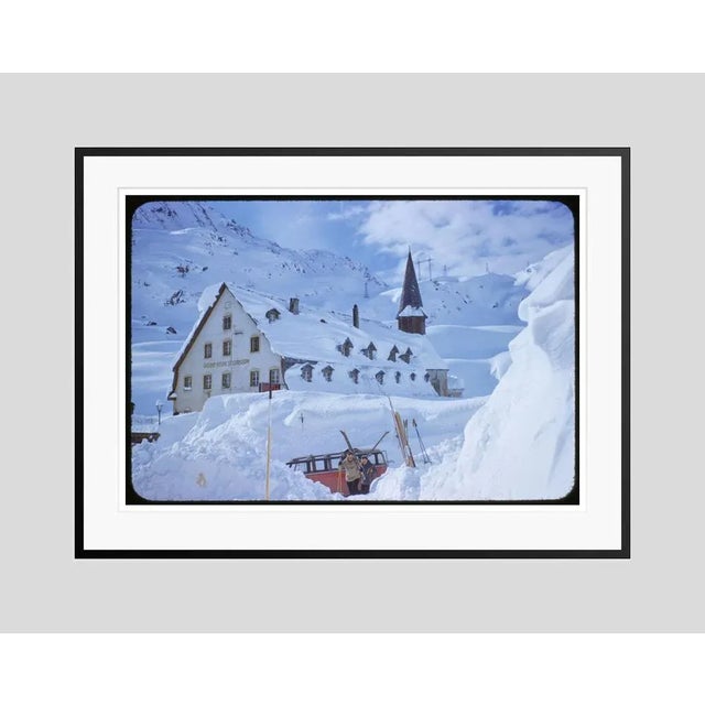A Hotel In The Mountains 1955 by Toni Frissell Skiers and a car in front of the Alberg Hozpis Hotel, St. Anton, Austria,...