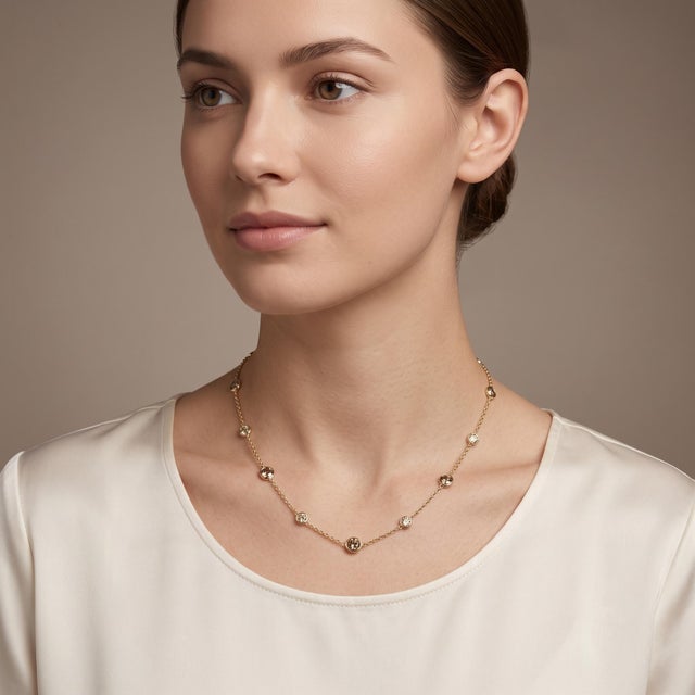 Elevate your elegance with our stunning Diamond by the Yard Necklace, featuring 18 exquisite diamond stations set in...