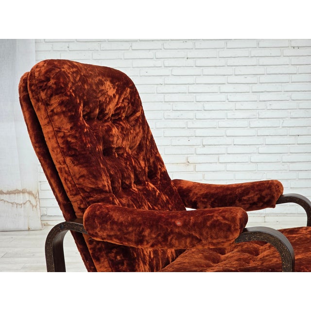 1970s, Danish vintage armchair. Original dark red furniture velour fabric, bent oak wood. Manufactured by Danish furniture...