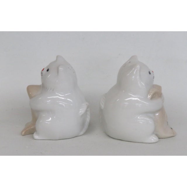 Mid 20th Century Ceramic Salt and Pepper Shakers White Cats Holding Beige Fish - a Pair For Sale - Image 4 of 8