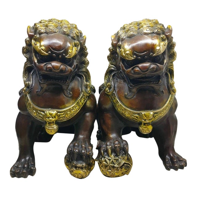 Pair of Vintage Chinese Gilt Bronze Guardian Lions (Foo Dogs) on Embroidered Balls For Sale