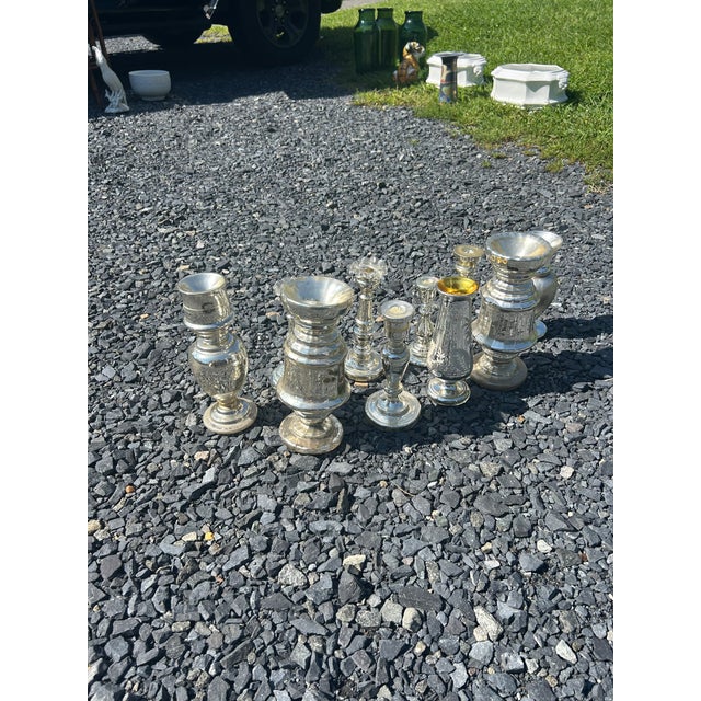 Rare collection of vintage mercury glass candlesticks and vases from Germany, many of which are hand painted with flowers....