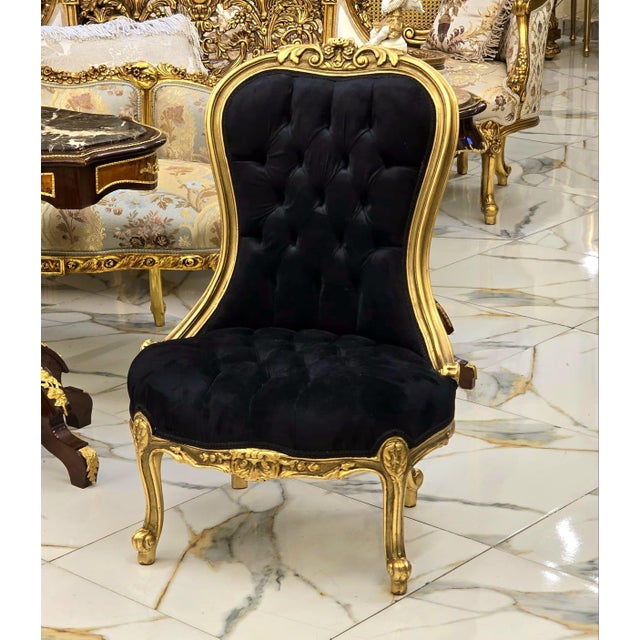 Elevate your interior with the timeless elegance of this French Louis XV accent chair. Upholstered in luxurious black...