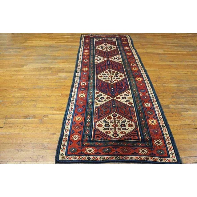 Handmade antique NW Persian carpet. Woven circa 1870 (late 19th century). Runner size 3'6" x 9'8". Rug has stacked diamond...