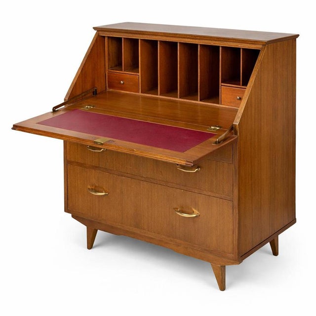 A classic mid-century writing bureau by Sutcliffe of Todmorden, combining elegant British craftsmanship with practical...