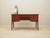 The desk was made in the 1970s, Danish production. The structure and tabletop are covered with teak veneer. The legs are...
