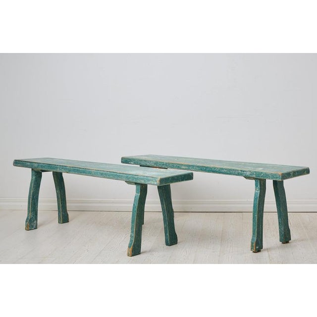 Pair of folk art benches from northern Sweden made around 1860. The benches are a unique pair and mostly likely made on...