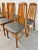This listing is for a set of eight Vintage Danish Modern Eva Style Teak Dining Chairs. Featuring a Koefoed Eva style...