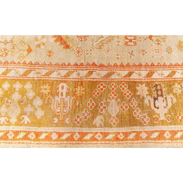 This exquisite antique rug, sourced from Doris Leslie Blau, showcases a rare blend of history and craftsmanship. The...