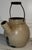 19th century batter jug with blue painted decoration. Pennsylvania origin circa 1820-1860. Beautiful form. the bottom of...
