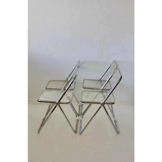 Vintage Lucite Chrome Plia Chairs Giancarlo Piretti for Castelli Italy, set of 4. These chairs are pre-loved and show lots...