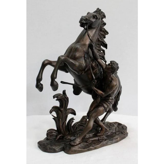 Bronze with a brown patina and discreet golden reflections signed "Coustou" on the terrace, taking as its theme one of the...