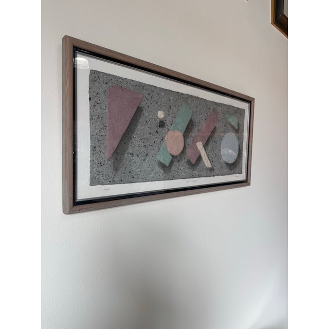 This striking 1985 limited-edition artwork by Wess, titled “Post Modern”, features bold geometric forms in soft pastel...