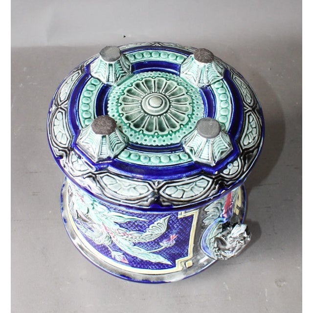 A striking example of French barbotine majolica, this richly modeled cache pot dates to the late 19th century and...
