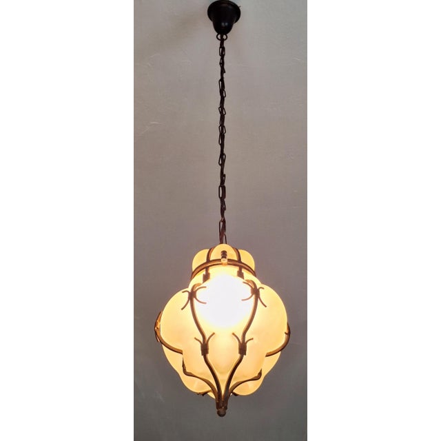 Venetian hall lantern or pendant light, frosted Murano glass hand-blown into an iron frame, Italy 1950-60. The height of...