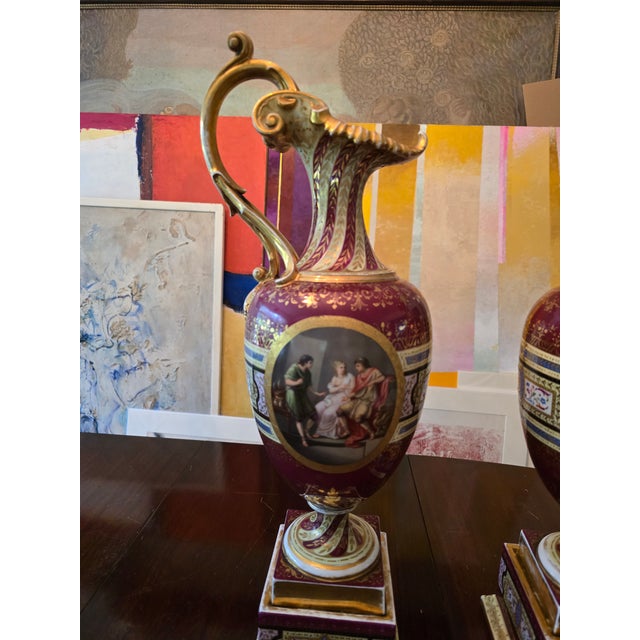 A superb pair of antique signed massive pair of Royal Vienna handpainted ewers / urns . Guaranteed to be 150 years or...