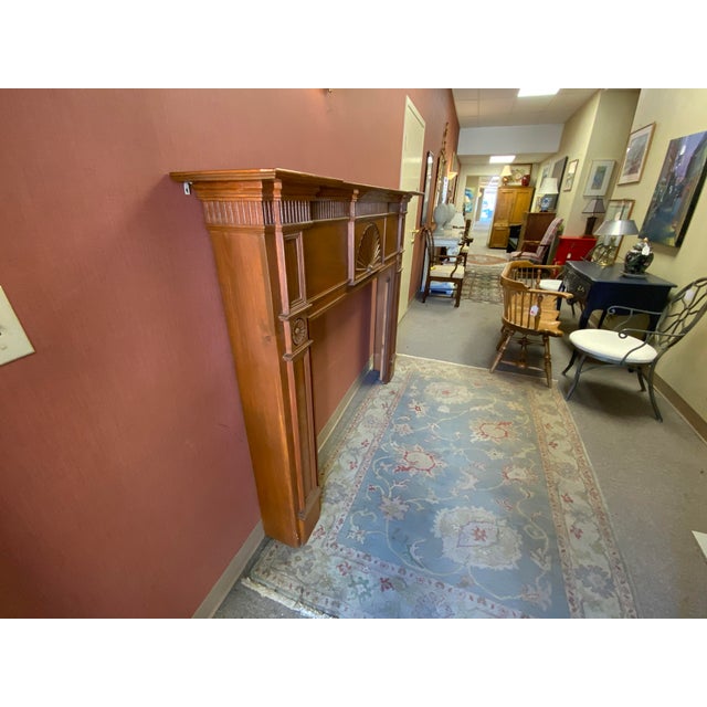 20th century fireplace mantle piece. Handcrafted in a federal style. Opening measures 48” width, 7.25” depth