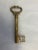 A lovely English brass bottle opener in the shape of a skeleton key. Hidden corkscrew. Stamped “made in England”. Hand...