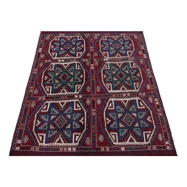 Rug & Kilim boasts this 4x5 vintage Turkish flatweave piece from its Kilim & Flatweave collection for its structural...