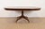 An exceptional Georgian or Regency style pedestal extension dining table, center table, or breakfast table In the manner...
