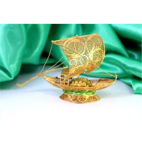 Rabelo Boat in Gilded Silver Filigree with Barrels, in Very Good conditions. Designed 1920 to 1949 This piece has an...