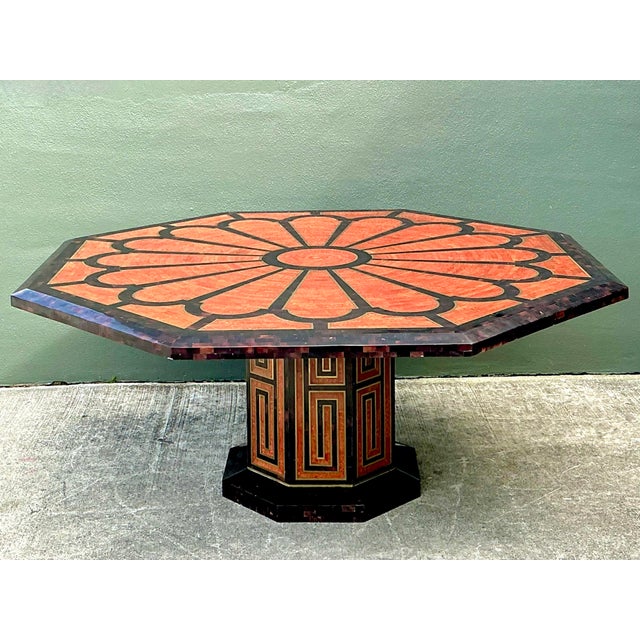 This striking octagonal dining table is a masterclass in Postmodern luxury, featuring an exquisite tessellated pen shell...