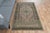 Vintage Hand-Knotted runner rug is a semi-antique vintage area rug. The '70s Eastern region of Anatolia's unique rug is...