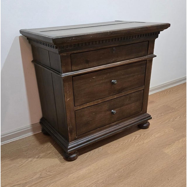 This pair of Restoration Hardware nightstands is from the St. James Collection, finished in Antiqued Coffee, with a...