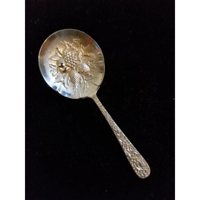 Sterling silver S. Kirk and son Bonbon with highly detailed floral and fruit designs. Repousse pattern.