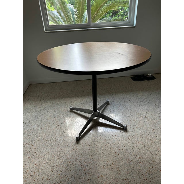Vintage 1970s Eames Aluminum Group Contract Table designed by Charles and Ray Eames for Herman Miller. Features a round...