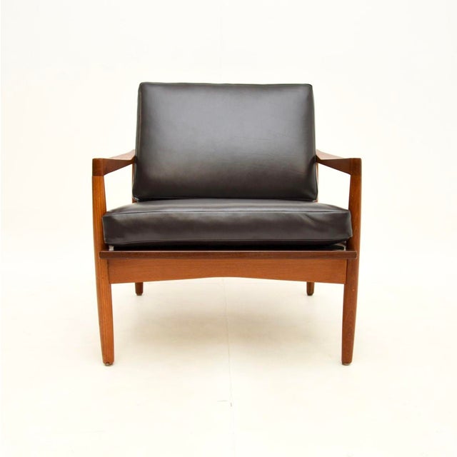 A smart and extremely well made Danish vintage teak and leather armchair by Christian Jensen for Haslev, dating from the...