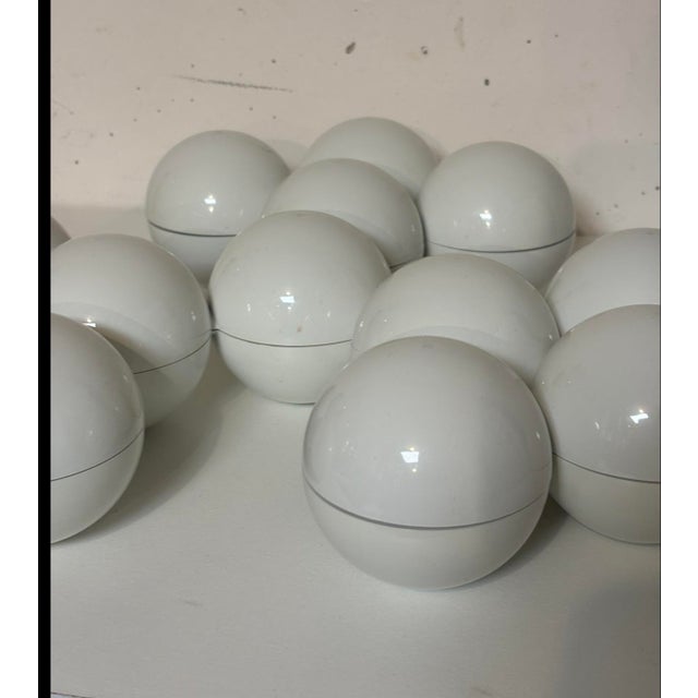 YONEL LEBOVICI rotating appetizer tray, circa 1970. The 13 black plastic balls open by rotating on the central axis....