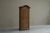 Early 19th Century Tall French Single Door Armoire or Bonnetière Cabinet in Solid Oak A remarkable early 19th century...